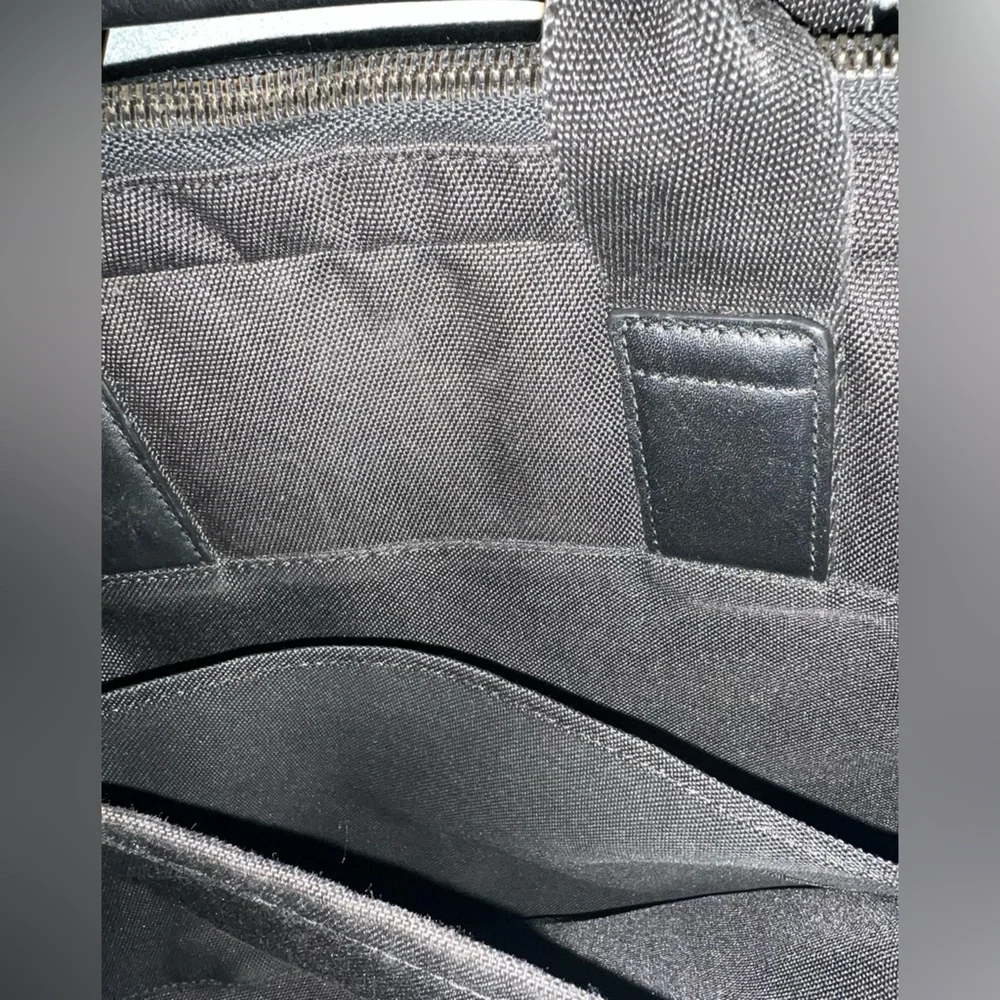 KNOMO Black Unisex Laptop Briefcase Messenger Bag with many compartments.